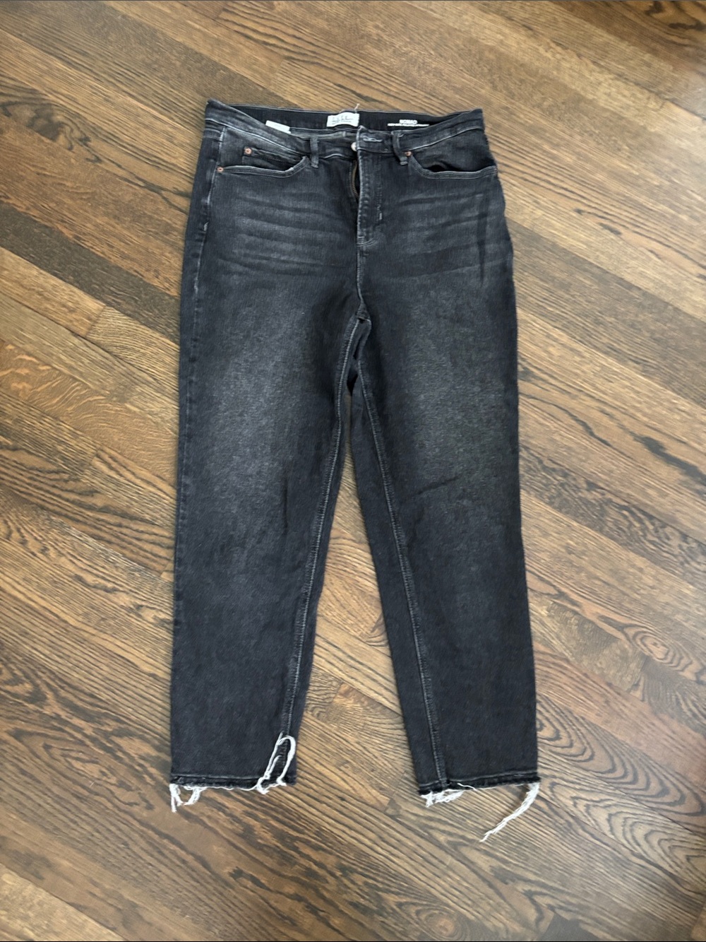High-Rise Black Washed Ankle Jeans with Raw Hem